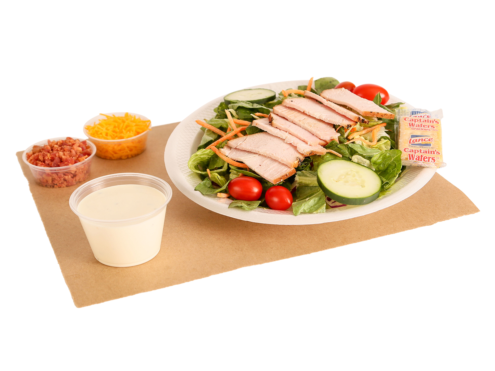 Salad De-Lite served with turkey , cheese, bacon bits, ranch dressing& crackers