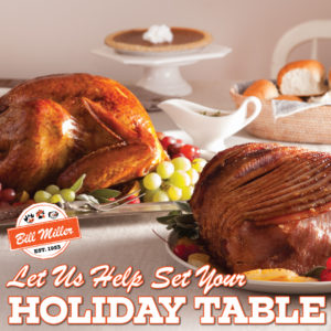 Bill Miller logo. Let us help set your holiday table. Background image includes holiday meal with turkey, honey glazed ham, gravy, dinner rolls, and pumpkin pie.