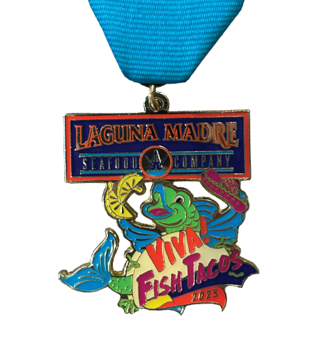 Laguna Madre Seafood Company 2023 fiesta medal with a green and light blue fish holding a sombrero inside a tortilla with two lemon slices. Verbiage "Viva! Fish Tacos 2023" 