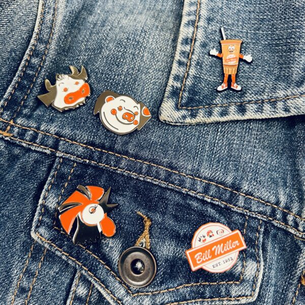 Bill Miller animals and sweetie enamel pins on jean jacket