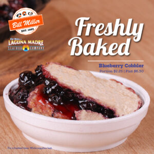 Freshly Baked Blueberry Cobbler Portion $2.25 | Pint $6.30 For a limited time while supplies last. Bill mIller logo Laguna madre logo image of a portion of cobbler on a wooden surface